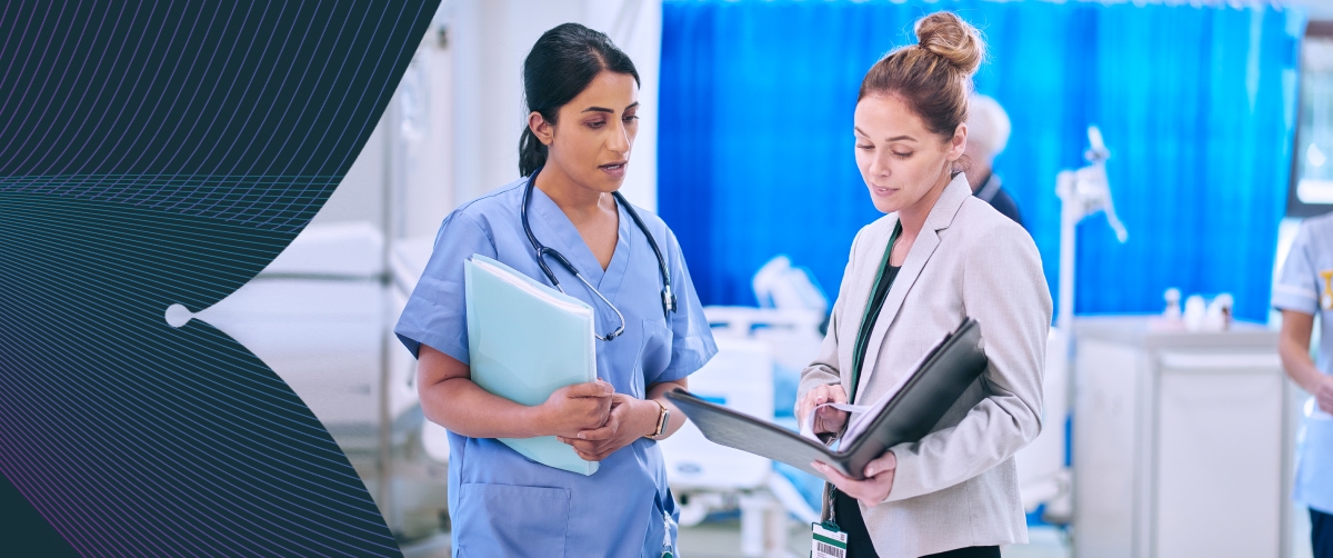 Hospital consultant chatting to administrator.